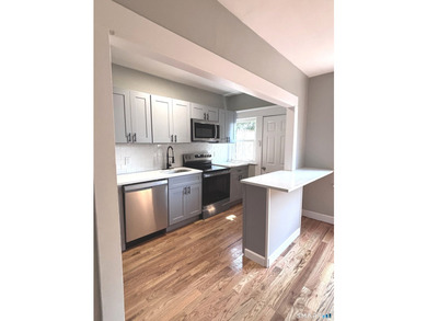 Investors or Savvy Homeowners! Welcome to this beautifully - photo 6