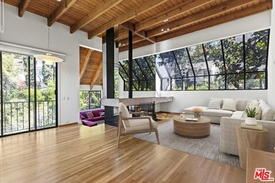 Built in 1980, this architectural gem showcases many of the - photo 12