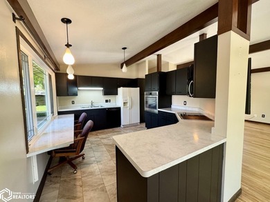 Welcome home to this well-maintained split foyer situated on a - photo 14
