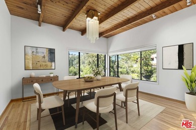 Built in 1980, this architectural gem showcases many of the - photo 15