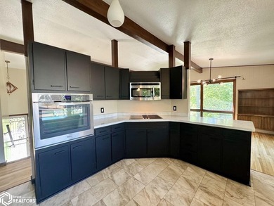 Welcome home to this well-maintained split foyer situated on a - photo 15