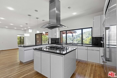 Built in 1980, this architectural gem showcases many of the - photo 16