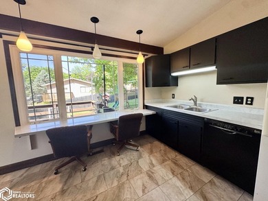 Welcome home to this well-maintained split foyer situated on a - photo 16