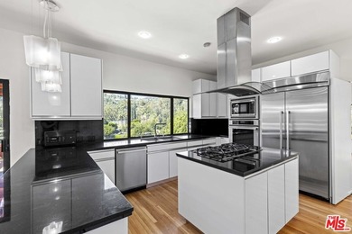 Built in 1980, this architectural gem showcases many of the - photo 17