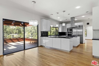 Built in 1980, this architectural gem showcases many of the - photo 18