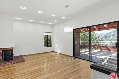 Built in 1980, this architectural gem showcases many of the - photo 19