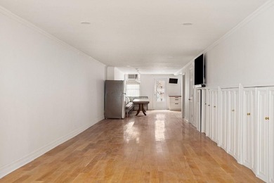 213 East 120th Street presents a compelling four-unit, mixed-use - photo 2