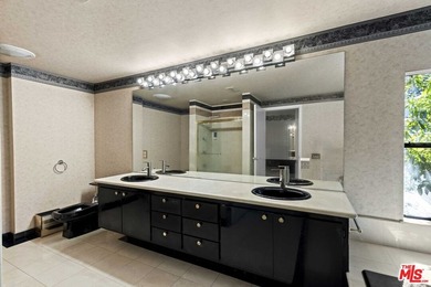 Built in 1980, this architectural gem showcases many of the - photo 24