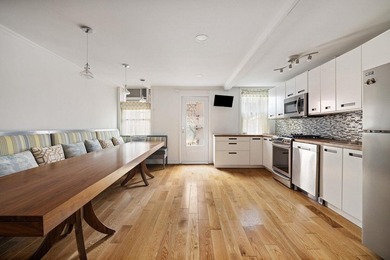 213 East 120th Street presents a compelling four-unit, mixed-use - photo 5