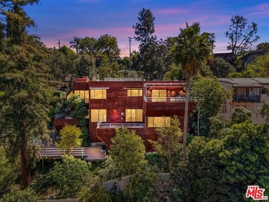 Built in 1980, this architectural gem showcases many of the - photo 27