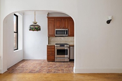 213 East 120th Street presents a compelling four-unit, mixed-use - photo 7