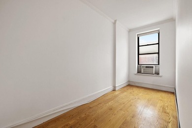 213 East 120th Street presents a compelling four-unit, mixed-use - photo 10