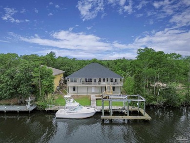 Experience the beauty of true waterfront living in this - photo 3