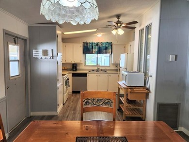 Bright and airy home's interior was completely painted and - photo 12