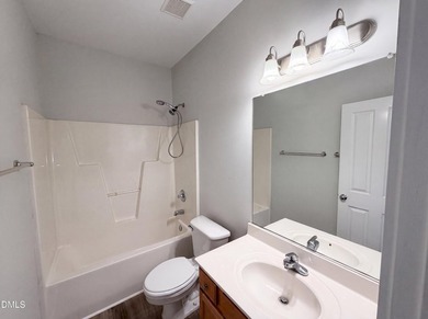 Welcome to this charming three-bedroom, two-and-a-half-bath - photo 12