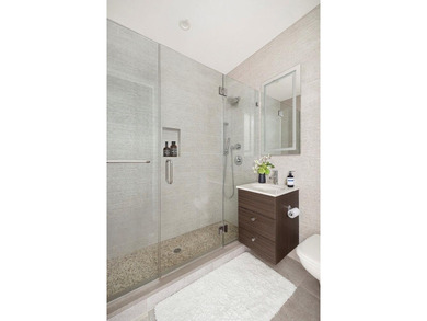 Residence 3B at 84 Oak Street is a design-forward home defined - photo 12