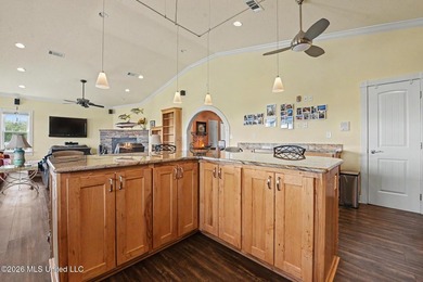 Tucked inside the highly sought-after Pass Christian Isles, this - photo 13
