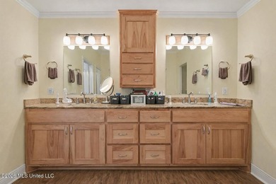 Tucked inside the highly sought-after Pass Christian Isles, this - photo 16