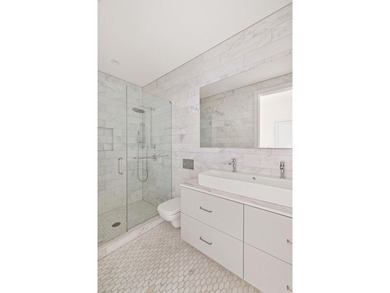 Residence 3B at 84 Oak Street is a design-forward home defined - photo 16