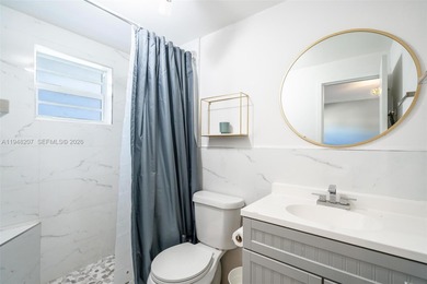 Updated 2/2, top floor, bright, open concept features includes