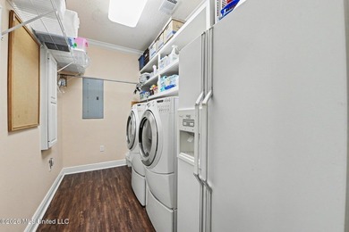 Tucked inside the highly sought-after Pass Christian Isles, this - photo 26