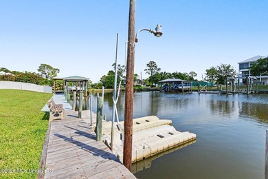 Tucked inside the highly sought-after Pass Christian Isles, this - photo 28