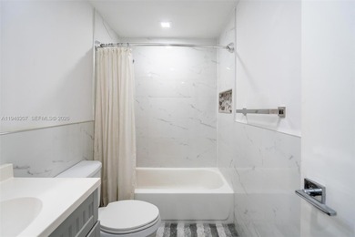 Updated 2/2, top floor, bright, open concept features includes