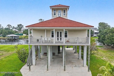 Tucked inside the highly sought-after Pass Christian Isles, this - photo 30
