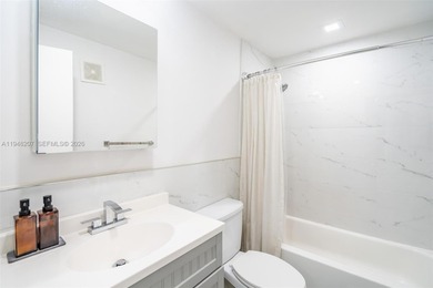 Updated 2/2, top floor, bright, open concept features includes