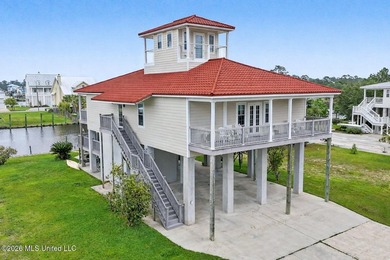Tucked inside the highly sought-after Pass Christian Isles, this - photo 32
