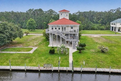 Tucked inside the highly sought-after Pass Christian Isles, this - photo 33