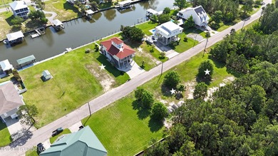 Tucked inside the highly sought-after Pass Christian Isles, this - photo 36