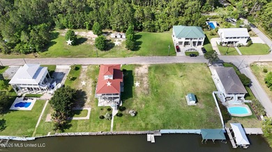 Tucked inside the highly sought-after Pass Christian Isles, this - photo 39
