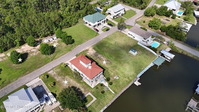 Tucked inside the highly sought-after Pass Christian Isles, this - photo 40