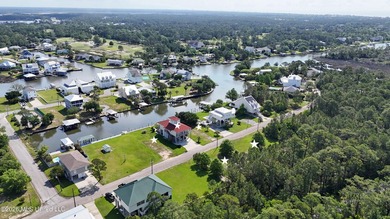 Tucked inside the highly sought-after Pass Christian Isles, this - photo 44