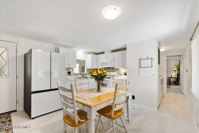 Improved Price! Enjoy low-maintenance living in this updated - photo 5