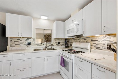 Improved Price! Enjoy low-maintenance living in this updated - photo 6