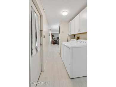 Improved Price! Enjoy low-maintenance living in this updated - photo 9