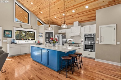 Set on 1.24 private waterfront acres, this exceptional - photo 3
