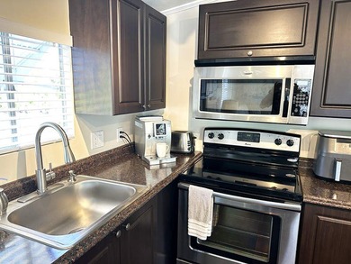 Welcome to this charming 1141 square feet manufactured home in - photo 8