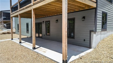 Stunning new-construction waterfront home at the Lake of the - photo 11