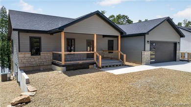 Stunning new-construction waterfront home at the Lake of the - photo 14