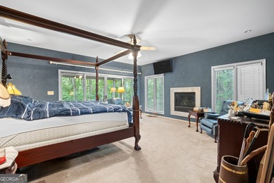 Set along the shores of Lake Lanier, this thoughtfully designed - photo 15