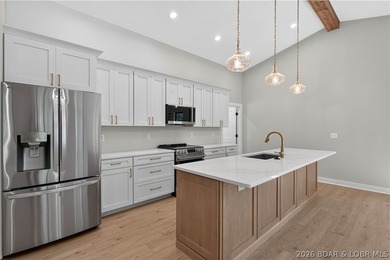Stunning new-construction waterfront home at the Lake of the - photo 19