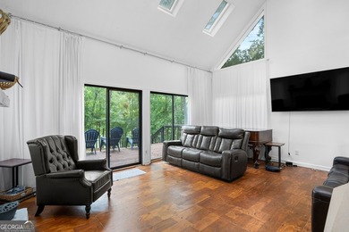 Set along the shores of Lake Lanier, this thoughtfully designed - photo 26