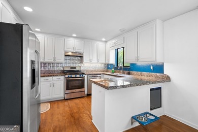 Set along the shores of Lake Lanier, this thoughtfully designed - photo 32