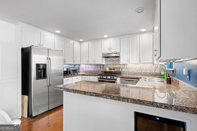 Set along the shores of Lake Lanier, this thoughtfully designed - photo 33