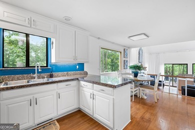 Set along the shores of Lake Lanier, this thoughtfully designed - photo 35