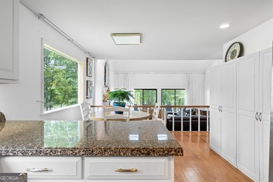 Set along the shores of Lake Lanier, this thoughtfully designed - photo 36
