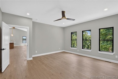 Stunning new-construction waterfront home at the Lake of the - photo 37